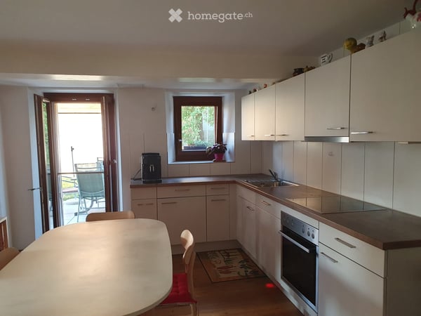 Appartement 3 pièces avec terrasse, jardin et place de parc 1
