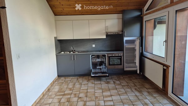 Spacieux appartement 3.5 pces au 1er étage sous les combles 1