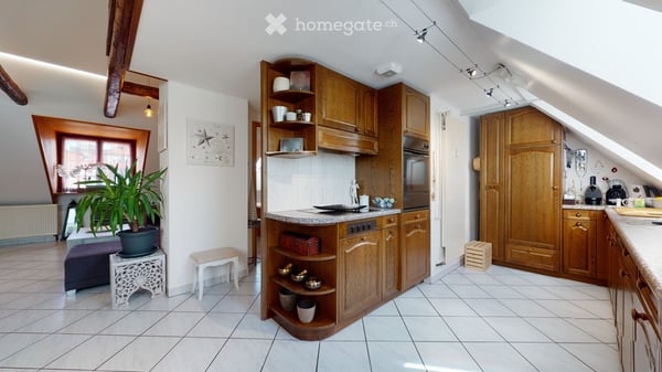 A louer bel appartement mansardé de 3.5 pièces traversant 1