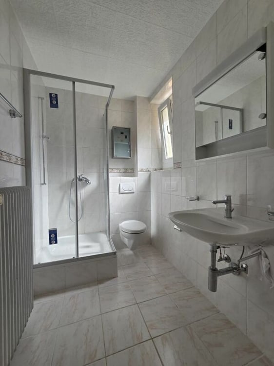 Appartement de 5 pièces 1/2 en duplex avec balcon et places de parc extérieures 9