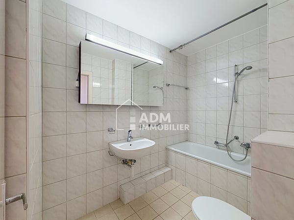 Appartement de 3.5 pièces avec deux places de parc 10