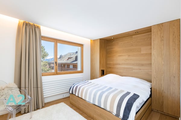 Appartement d'exception au centre de Crans-Montana, vue panoramique 11