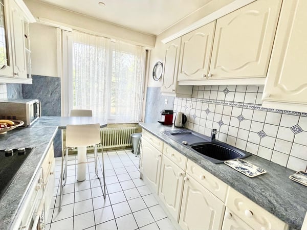 Élégance intemporelle et volumes généreux 1.5 pièces traversant à deux pas du parc Bertrand, à Champel 11