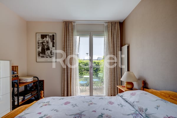 En Exclusivité : Charmant appartement avec terrasse et jardin à Bernex 6