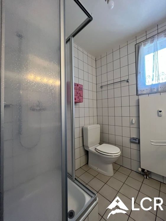 Magnifique immeuble à Leysin / 2 Appartements et 2 commerces / 7 places de parc 10