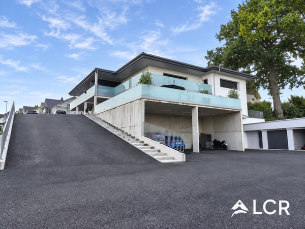 Magnifique appartement de 4.5P / 3 CHB / 2 SDB / 1 balcon / 2 places de parc 7