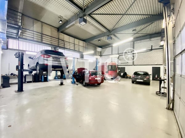 Industriegebäude 2020 m2 und Grundstück 1615 m2 Bösingen zu verkaufen 1