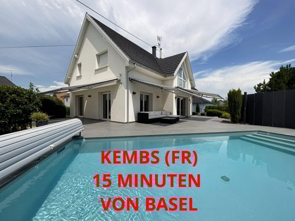 Voici la traduction en allemand : **Wunderschönes modernes Haus mit Pool in Kembs** 1