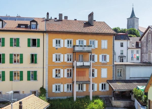 Immeuble locatif de 4 logements et un 1 commerce Au coeur de Ste-Croix 2