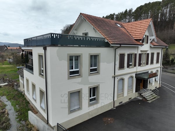 Magnifique immeuble locatif de 5 appartements à Vicques 1