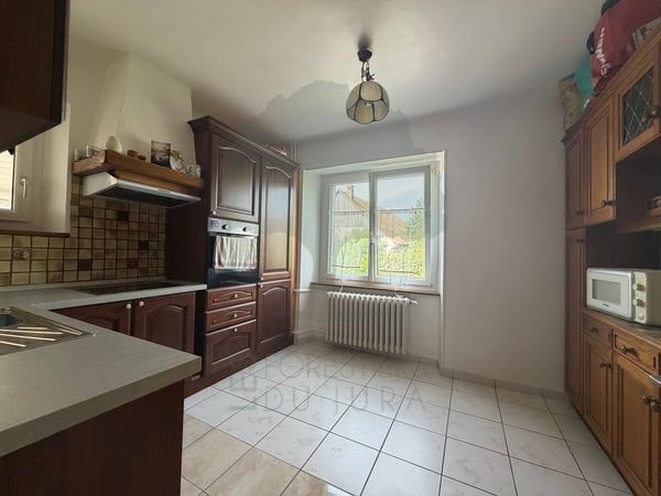 Maison locative composée de trois appartements à Cornol 7