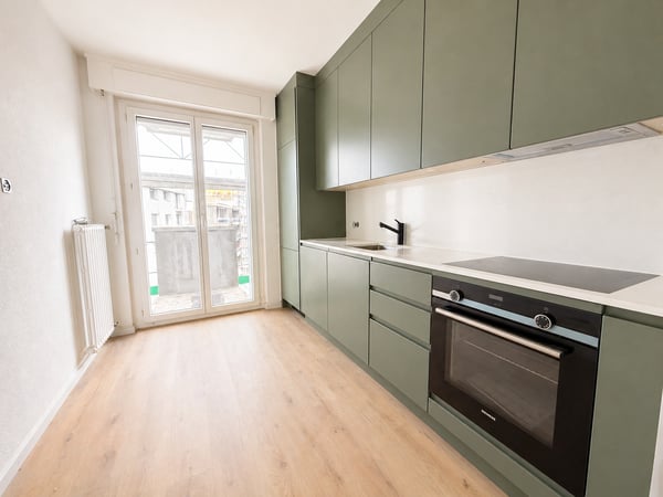 Fribourg : 3.5 pièces rénové de 88 m² avec deux balcons 2