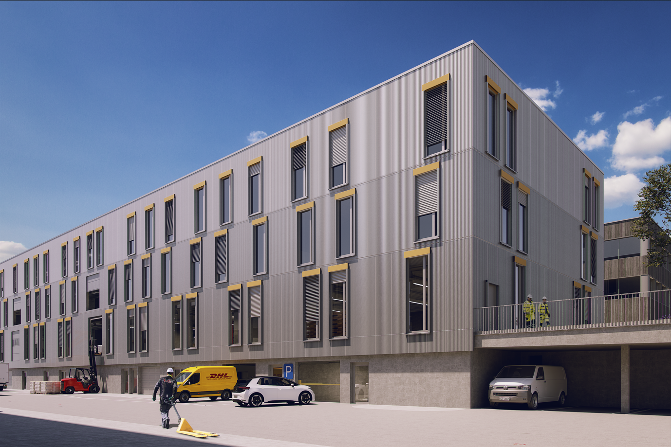Large office building, grey and yellow exterior, multiple windows, underground parking