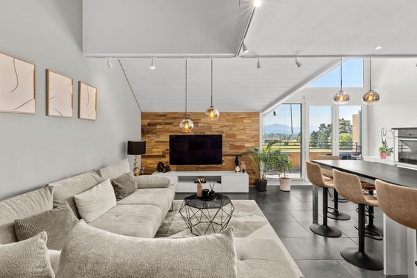 Élégance et confort pour cette attique en duplex avec vue sur le lac et les Alpes