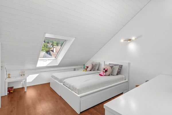 Élégance et confort pour cette attique en duplex 4,5 pièces avec vue sur le lac et les Alpes 8