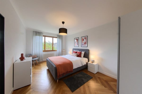 Spacious 2-Bedroom Furnished Apartment with Balcony and River Views in Geneva 1