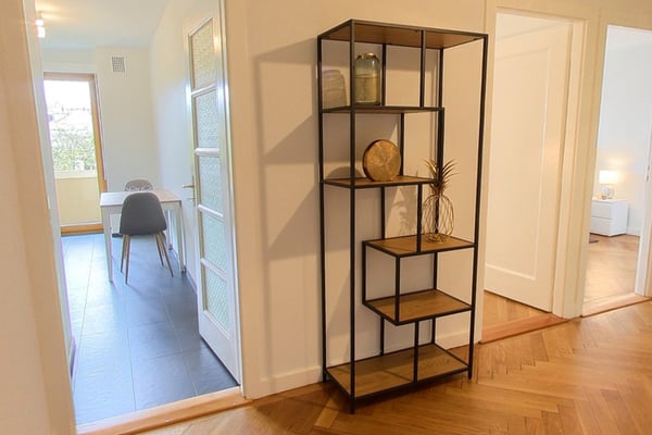 Spacious 2-Bedroom Furnished Apartment with Balcony and River Views in Geneva 14