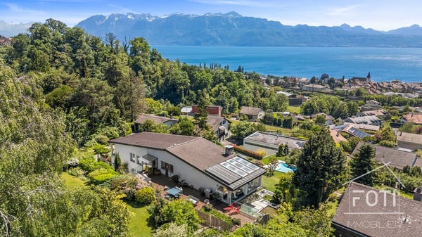 Superbe duplex de standing de 5,5 pièces avec jardin et piscine privée. 9