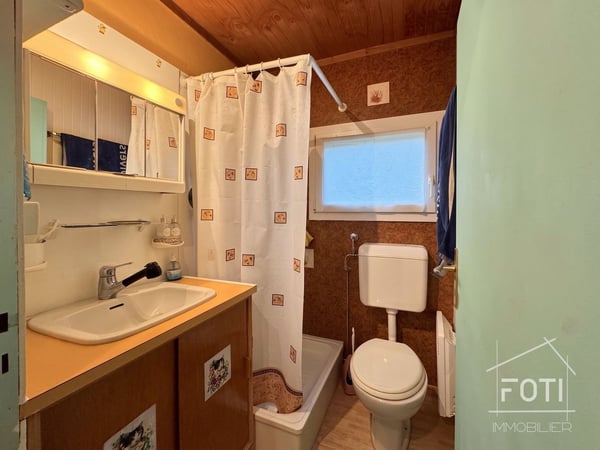 Chalet 2,5 pièces à rénover - jardin, terrasse et vue montagne 10