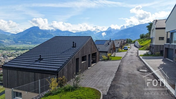 Villa individuelle NEUVE de 4,5 pièces avec belle vue sur la plaine. 13