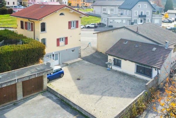 Maison multi-appartements avec local commercial et dépôt / bureau 5