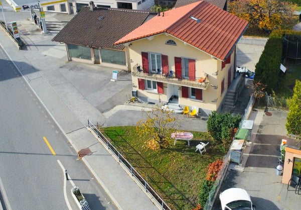 Maison multi-appartements avec local commercial et dépôt / bureau 4