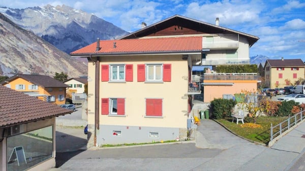 Maison multi-appartements avec local commercial et dépôt / bureau 3