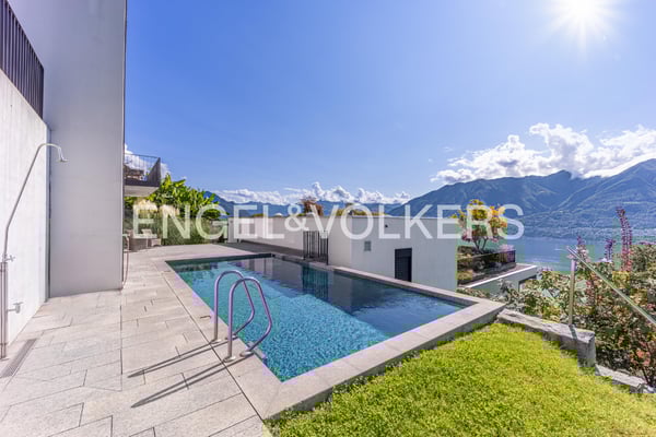 Splendido appartamento di 1.5 locali con vista lago e piscina (70) 12