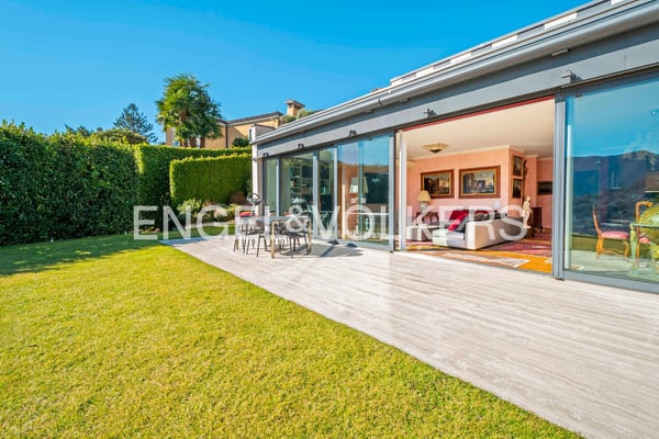 Prestigioso appartamento con giardino e vista lago 13