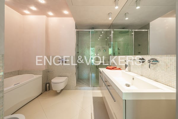 Esclusivo appartamento con giardino e vista lago 9