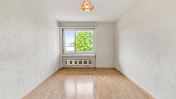 Helle 5.5-Zimmer-Wohnung mit Südwest-Balkon und Blick ins Grüne 9