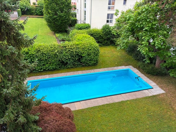Maisonette- Attikawohnung mit grosser Dachterrasse und Poolanlage 14