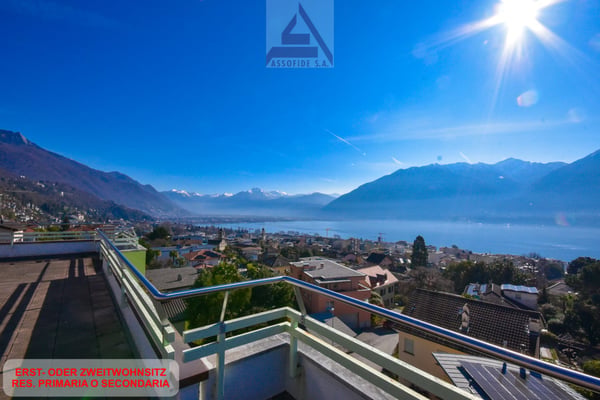 Attico da sogno con vista panoramica / Traumhafte Attikawohnung mit Panoramablick 1