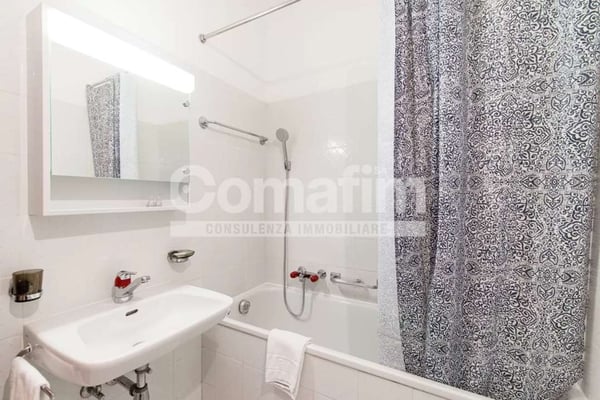 Appartamento arredato con vista lago 10