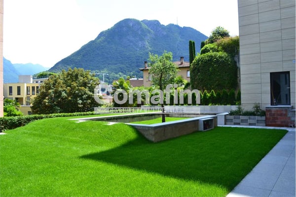 Lugano, ampio appartamento 1 1/1 loc. con giardino 2