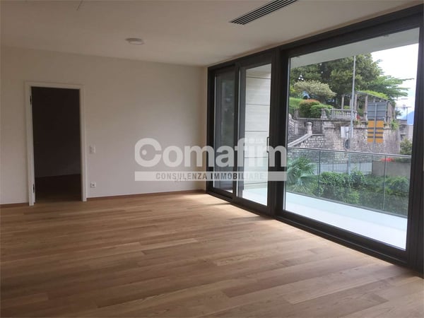 Lugano, ampio appartamento 1 1/1 loc. con giardino 3