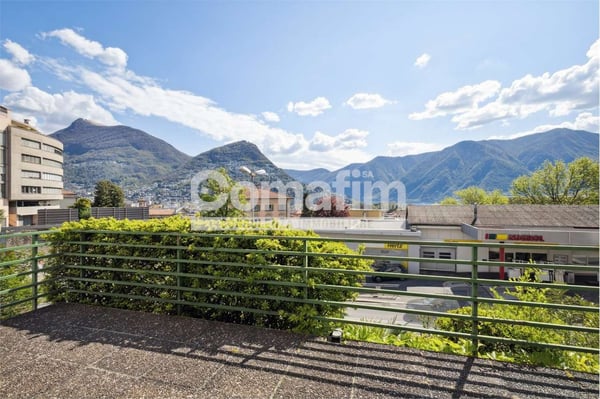 Appartamento con vista su Lugano nel cuore della c 1