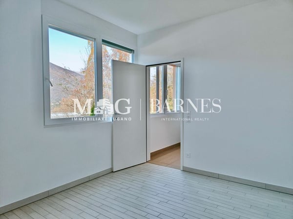 Lugano: Casa a schiera di ampie dimensioni adatta alle famiglie, 210 mq. superficie commerciale 11