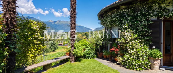 Comano: Appartamento 4.5/5.5 locali con giardino privato e piscina 2