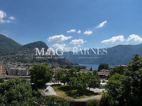 Lugano: Appartamento 2.5 locali centrale con balcone e box auto 1