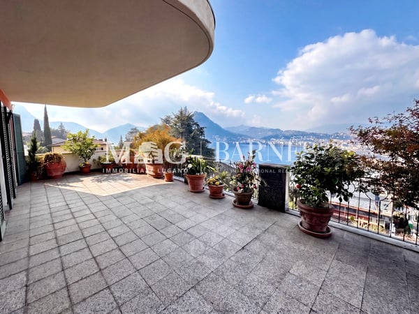 Appartamento 3.5 locali a Ruvigliana con terrazza vista lago di Lugano 2