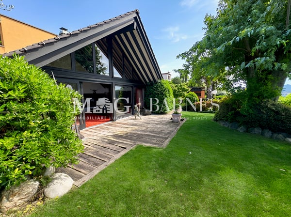 Villa d'autore a Comano con giardino e vista aperta, da rinnovare 2