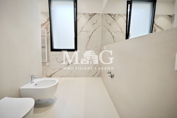 Lugano Centro: Appartamento 4.5 locali con giardino vicino al lago 10