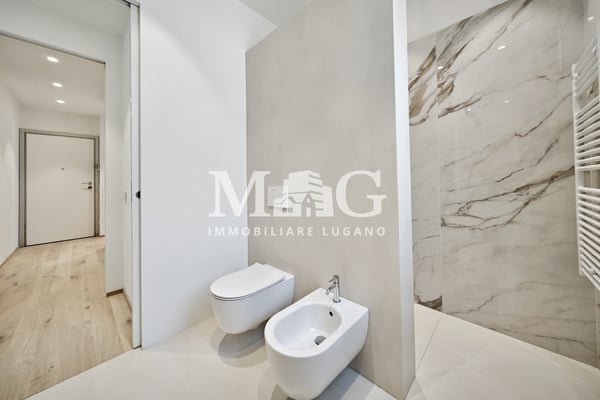 Lugano Centro: Appartamento 4.5 locali con giardino vicino al lago 9