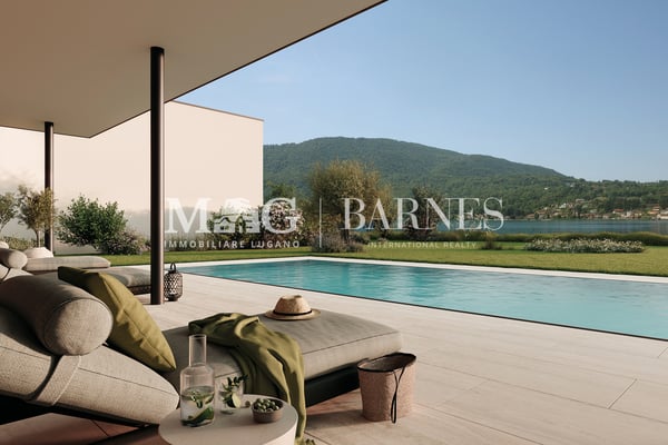 Villa di testa fronte lago con giardino privato a Caslano 6
