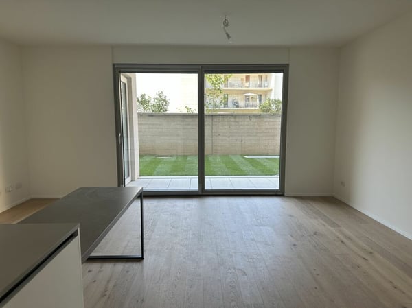 OCCASIONE - Elegante bilocale con giardino privato in residenza di nuova costruzione 1