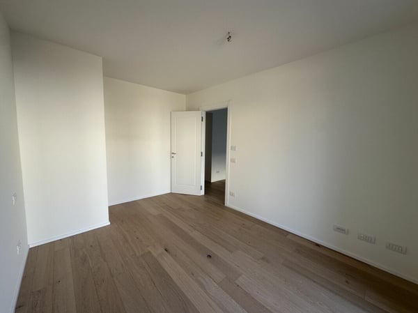 OCCASIONE - Elegante bilocale con giardino privato in residenza di nuova costruzione 7