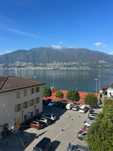 Prestigioso attico con vista lago e ampie terrazze 1