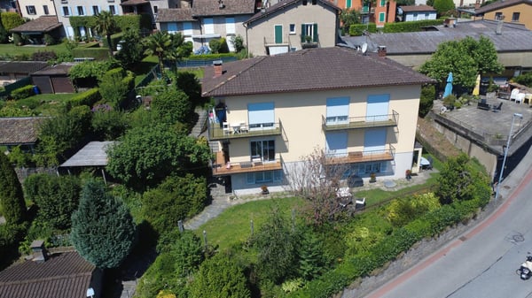 Casa plurifamiliare con ampio giardino a Comano 7