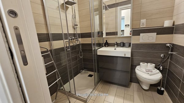 Accogliente appartamento 1.5 locali con balcone e vista panoramica a Caslano 7